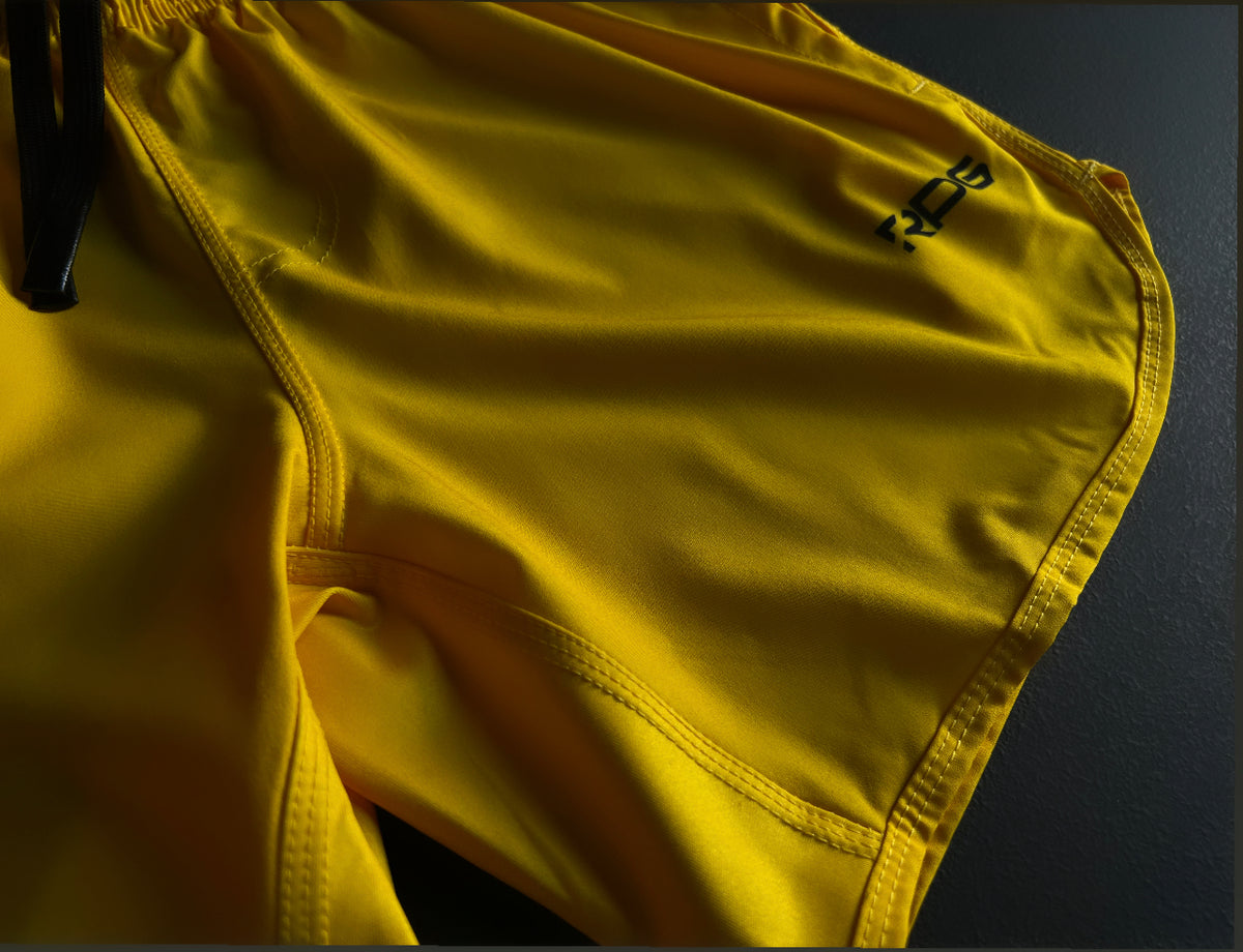 MEN&#39;S RPG YELLOW PERFORMANCE SHORTS (NEW)